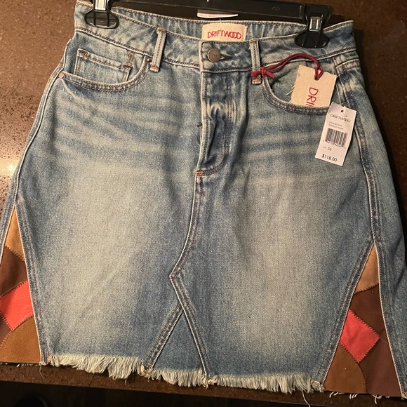 Driftwood denim mini skirt. Suede patch details. Medium wash. 16 1/2” length. - Picture 2 of 5